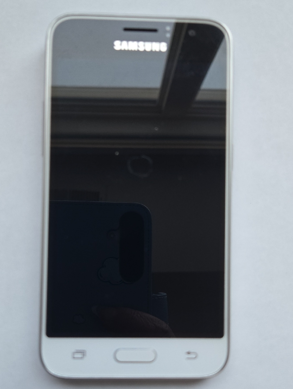 Samsung Galaxy Express 3 white smartphone with black display. Gently Used.